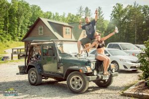 mmfest fans standing on top of jeep at ace adventure resort in the new river gorge west virginia