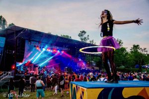 dancer on dance box with Twiddle at mountain music festival on wonderland mountain at ACE Adventure Resort