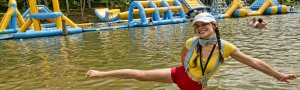 girl performer Maria Ekaterina in the lake wonderland waterpark at ace adventure resort mountain music festival beach party