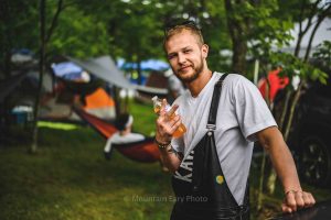 festival goer in campground at mountain music festival 2019