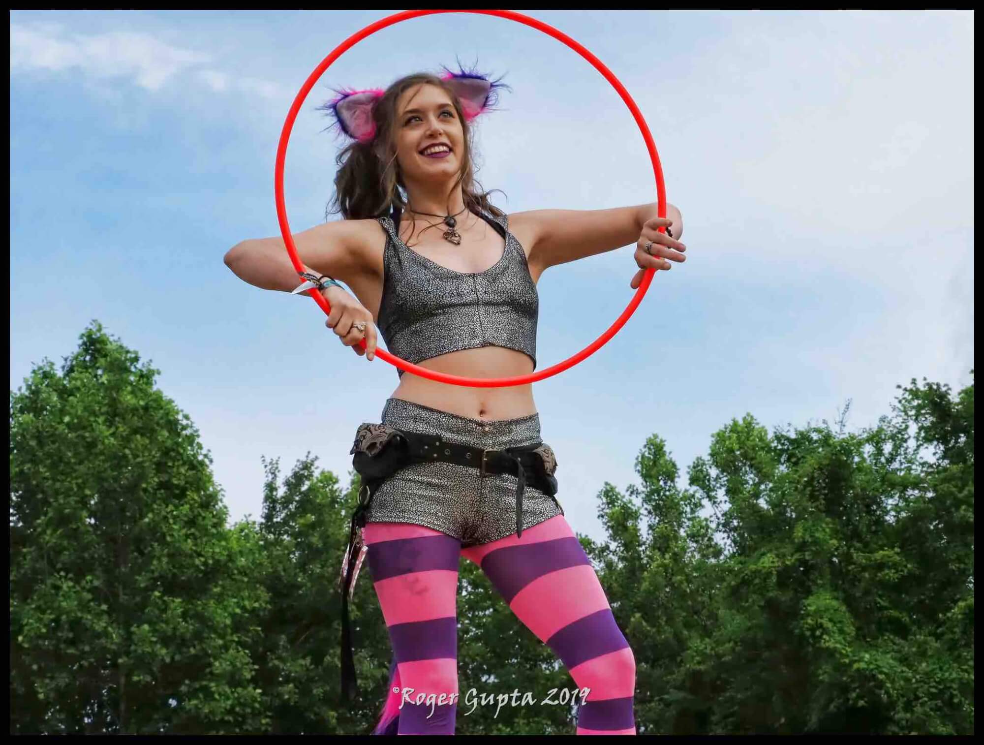 performer hula hoop girl at mountain music festival 2019 wonderland mountain cheshire cat ace adventure resort alice in wonderland