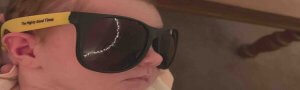 baby wearing The Mighty good times branded sunglasses