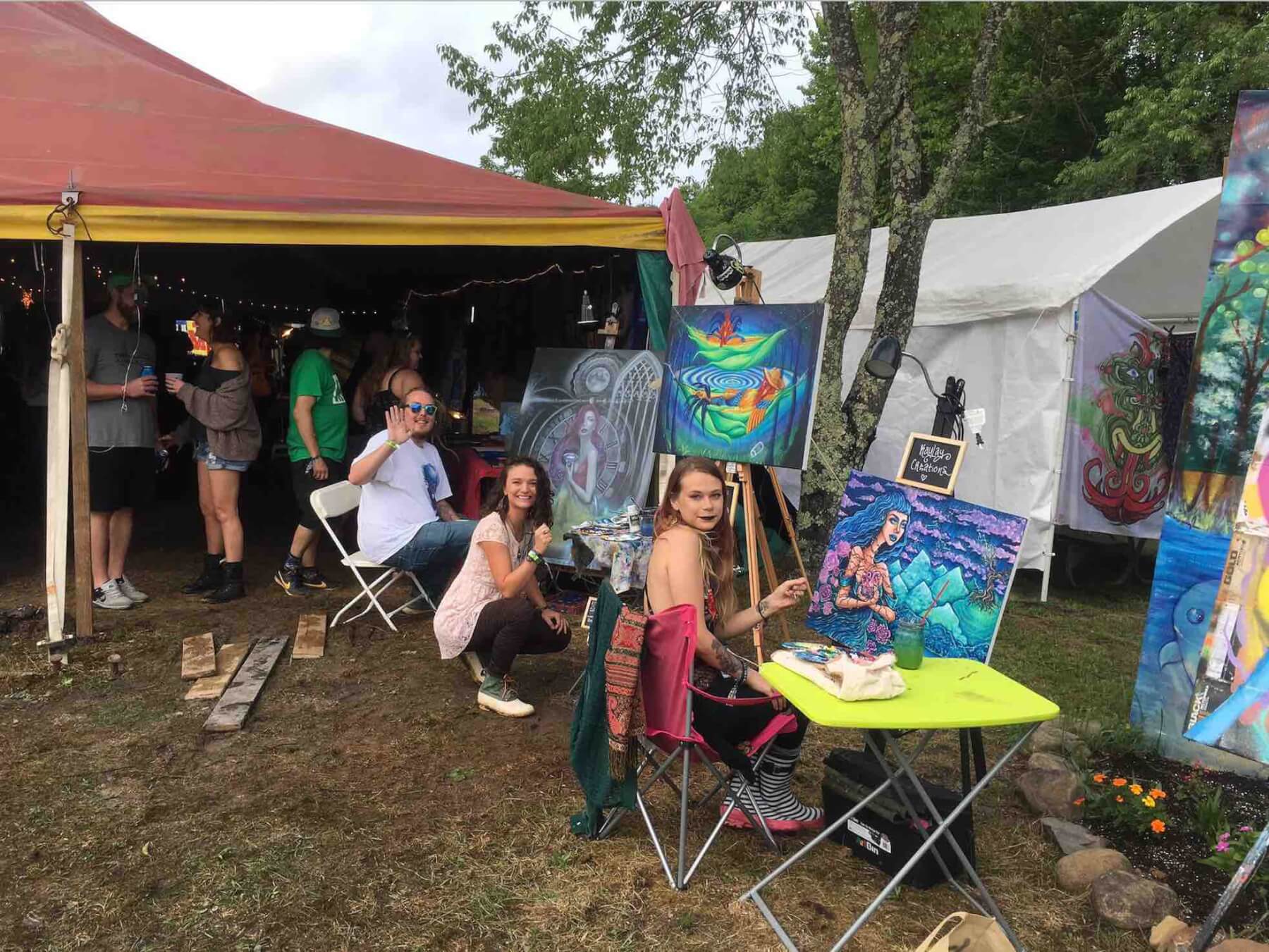 visual artist team outside pigment sanctuary at mountain music festival 2019