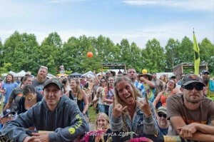 fans at mountain music festival 2019 riding the rail