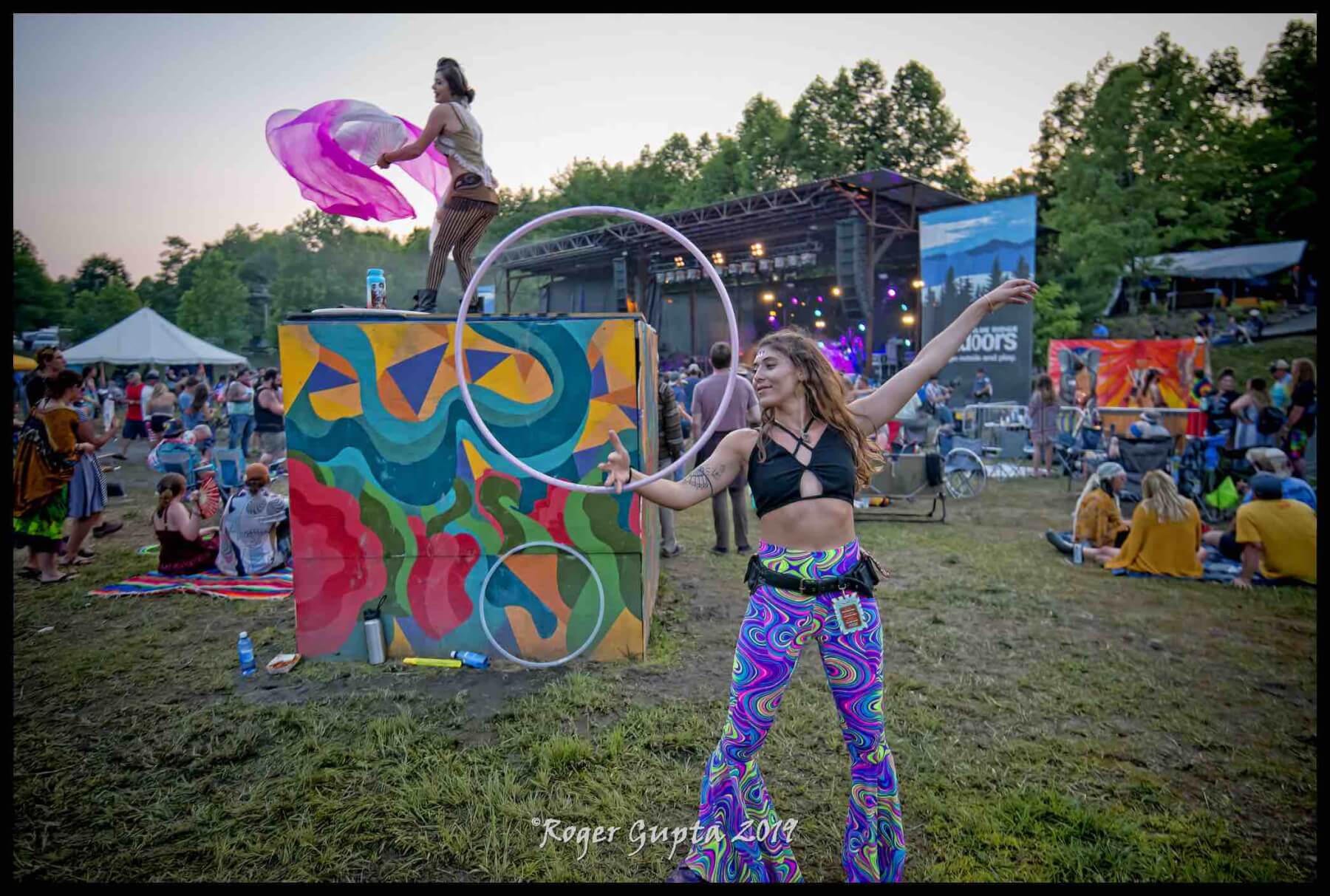hoop girls dance performers in front of main stage at mountain music festival 2019