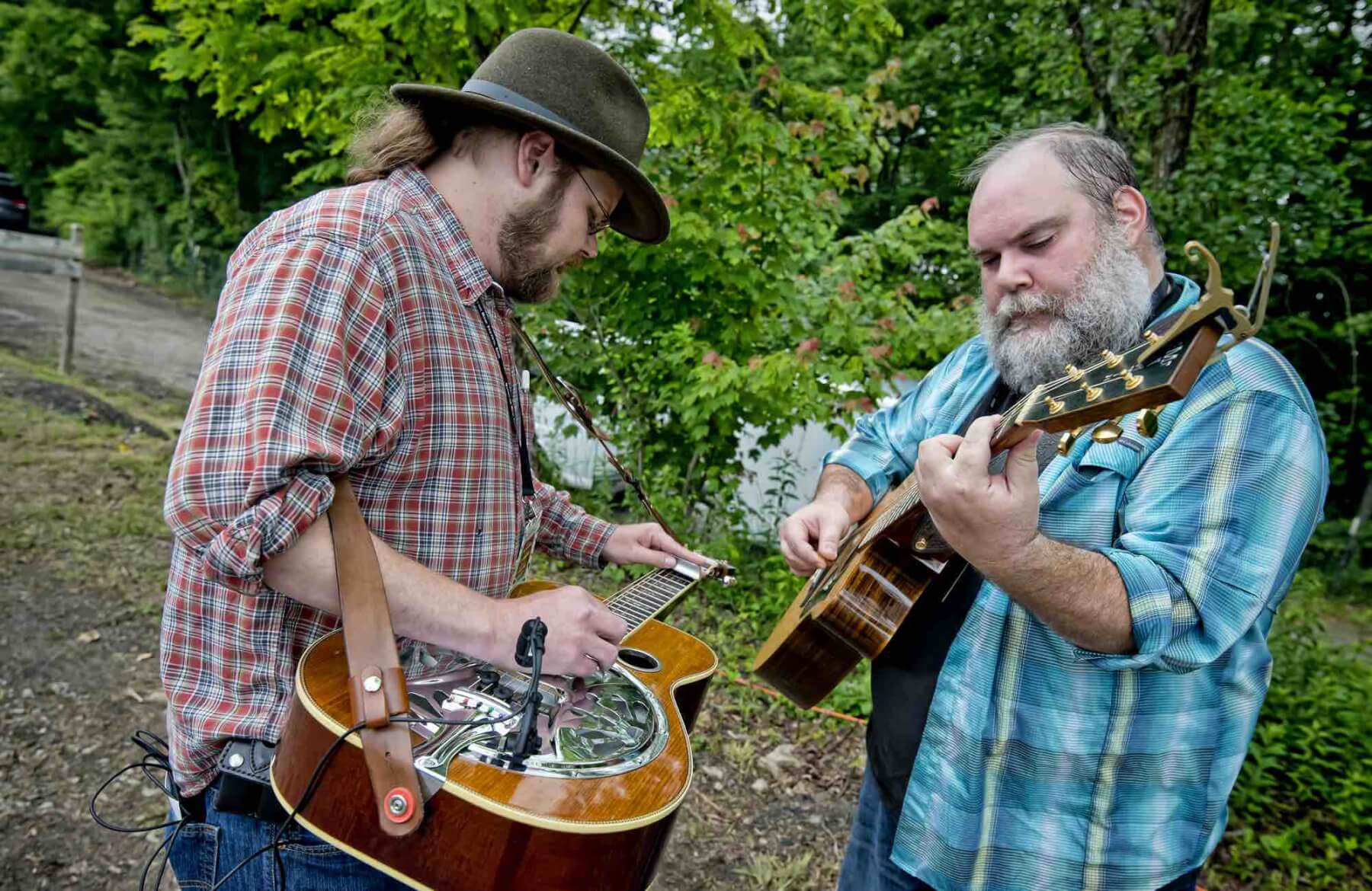 Paul johnson and corey lee mcquade warm up at mountain music festival 