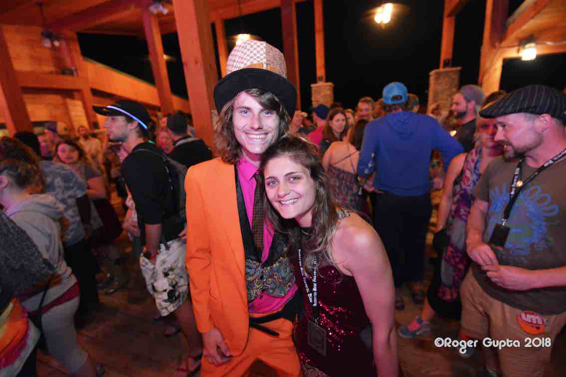 couple mad hatter at lost paddle during mountain music festival
