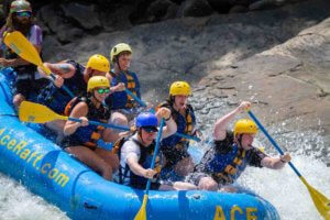 jimbo guiding ace adventure resort raft into lower keeney rapid on the lower new river gorge happy whitewater rafter