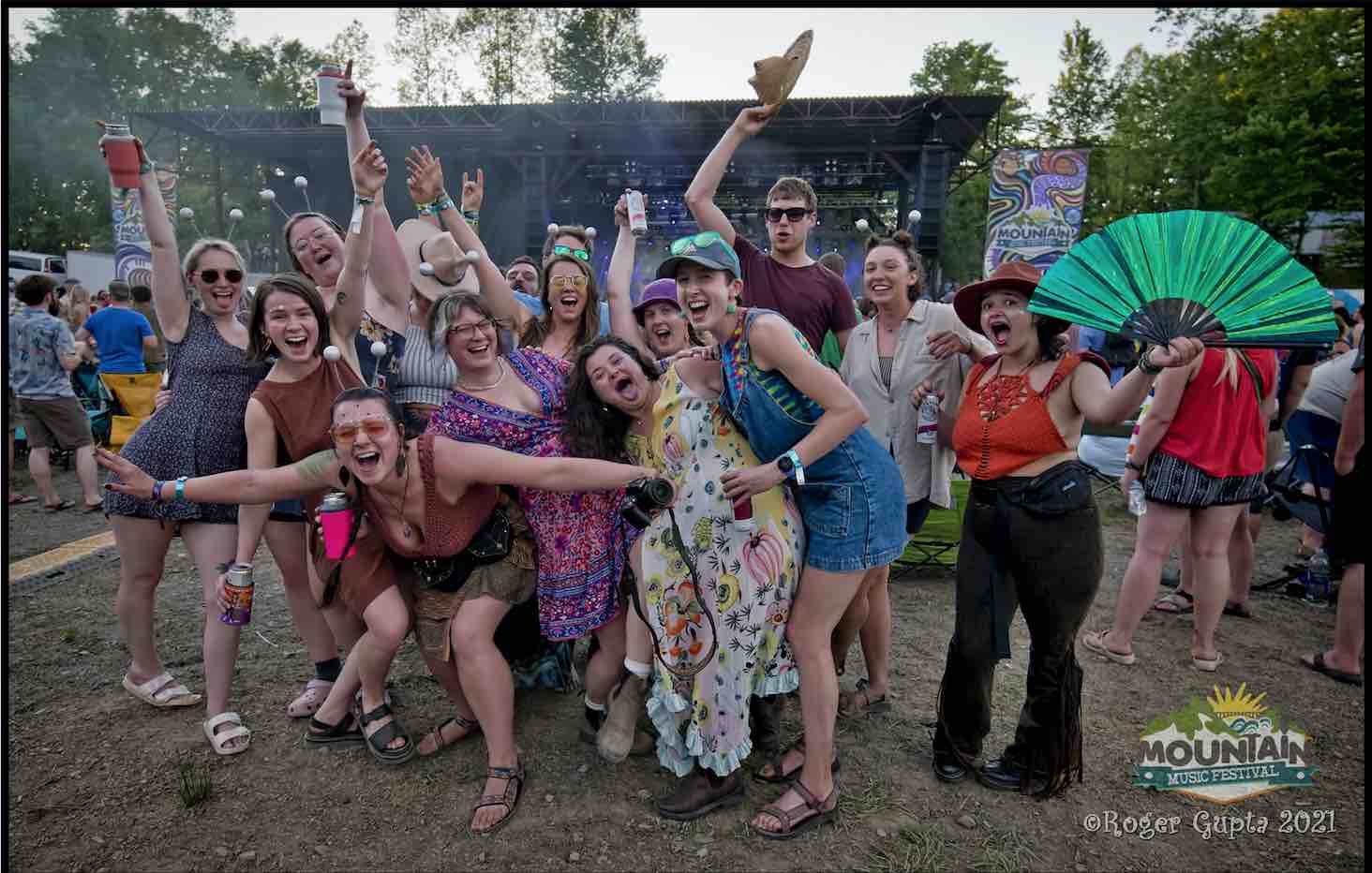 happy people in front of stage at mountain music festival 2021