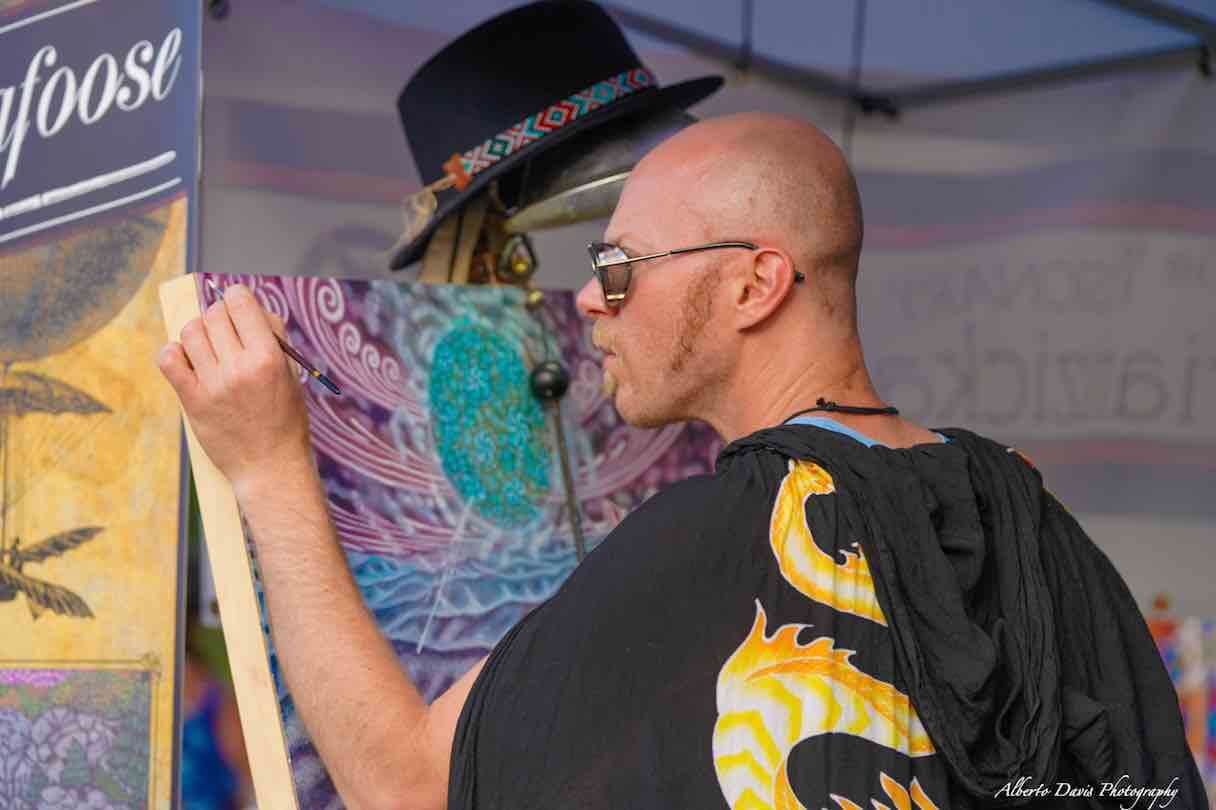Brian zickafoose painting at mountain music festival