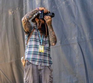 photographer getting the shot at mountain music festival