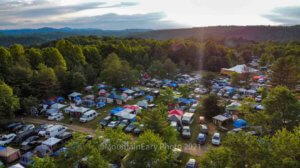 campground at mountain music festival drone shot with mountains in background fayette county west virginia