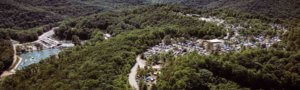 mountaintop and waterpark drone shot mountain music festival