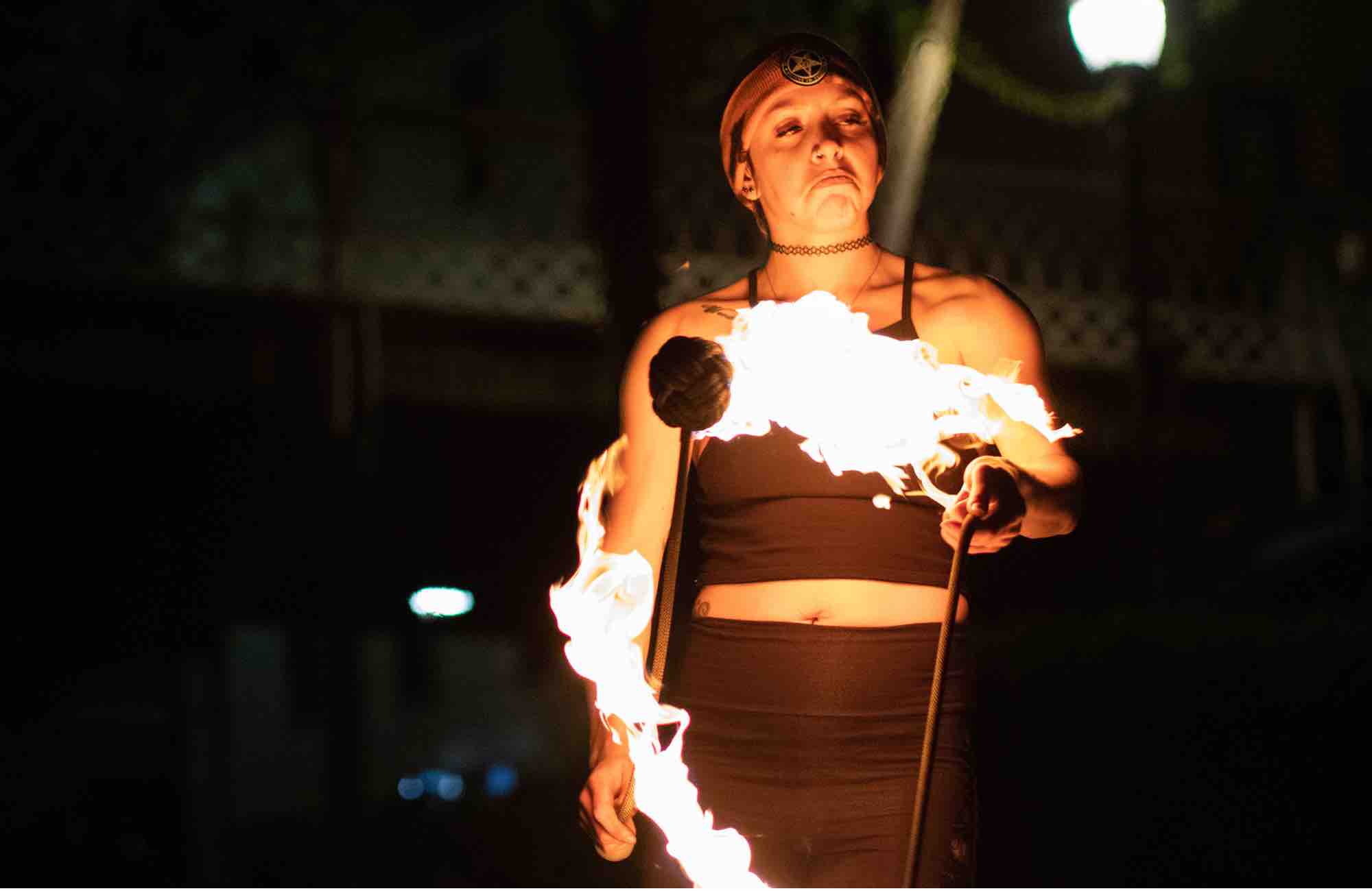 Fire performer at mountain music festival