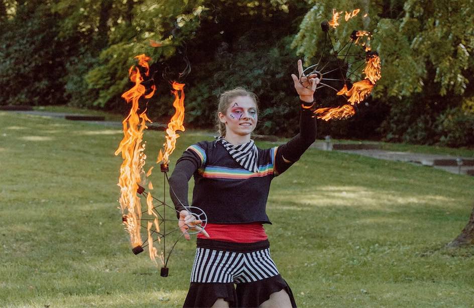 Fire performer at mountain music festival