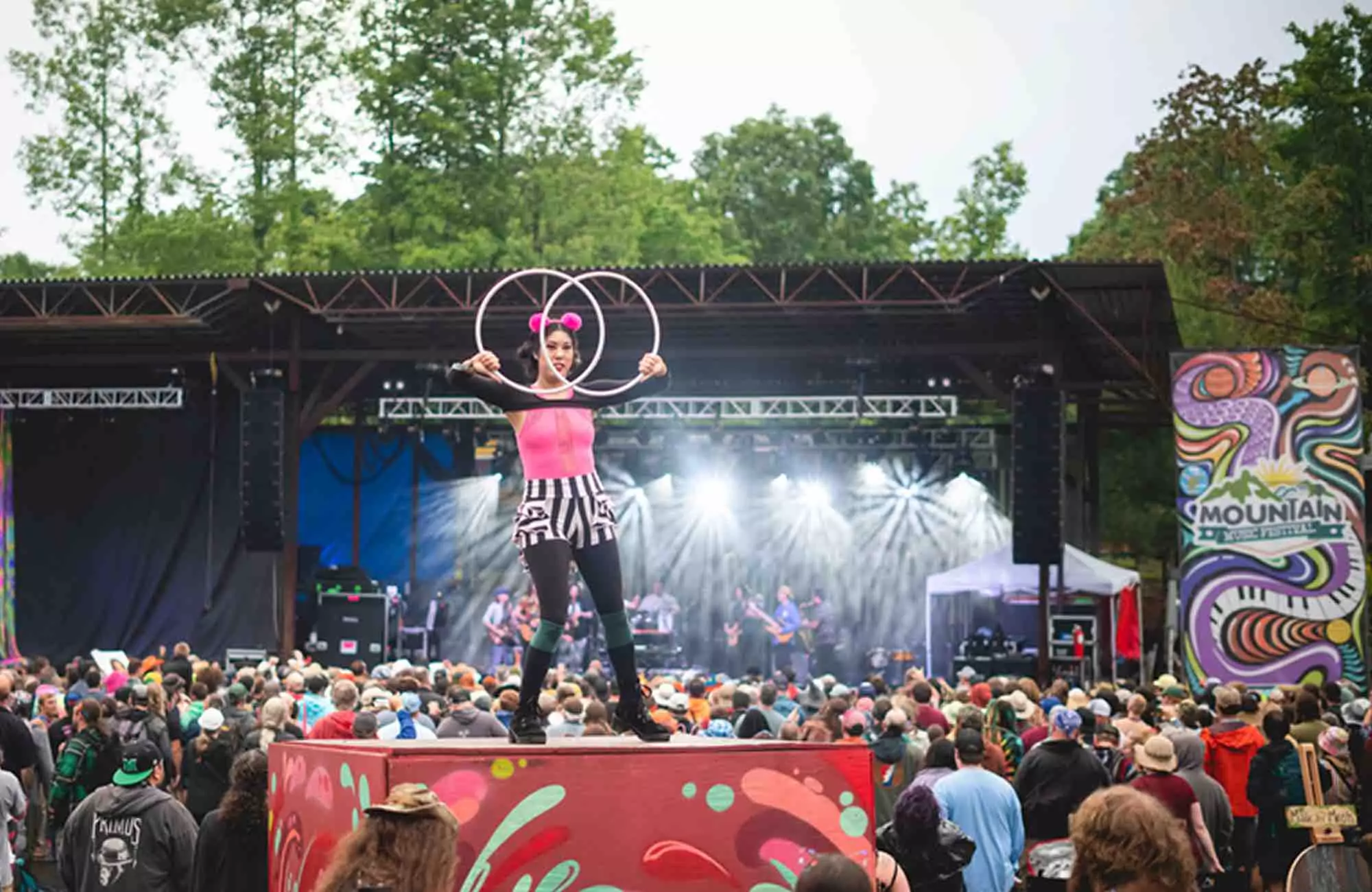 Fire performer at mountain music festival