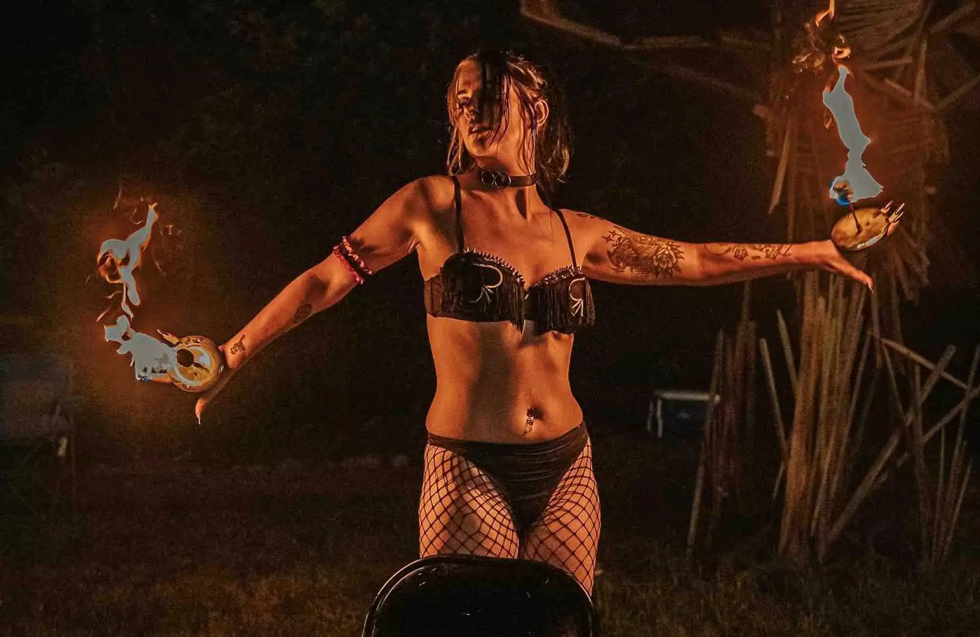 Fire performer at mountain music festival