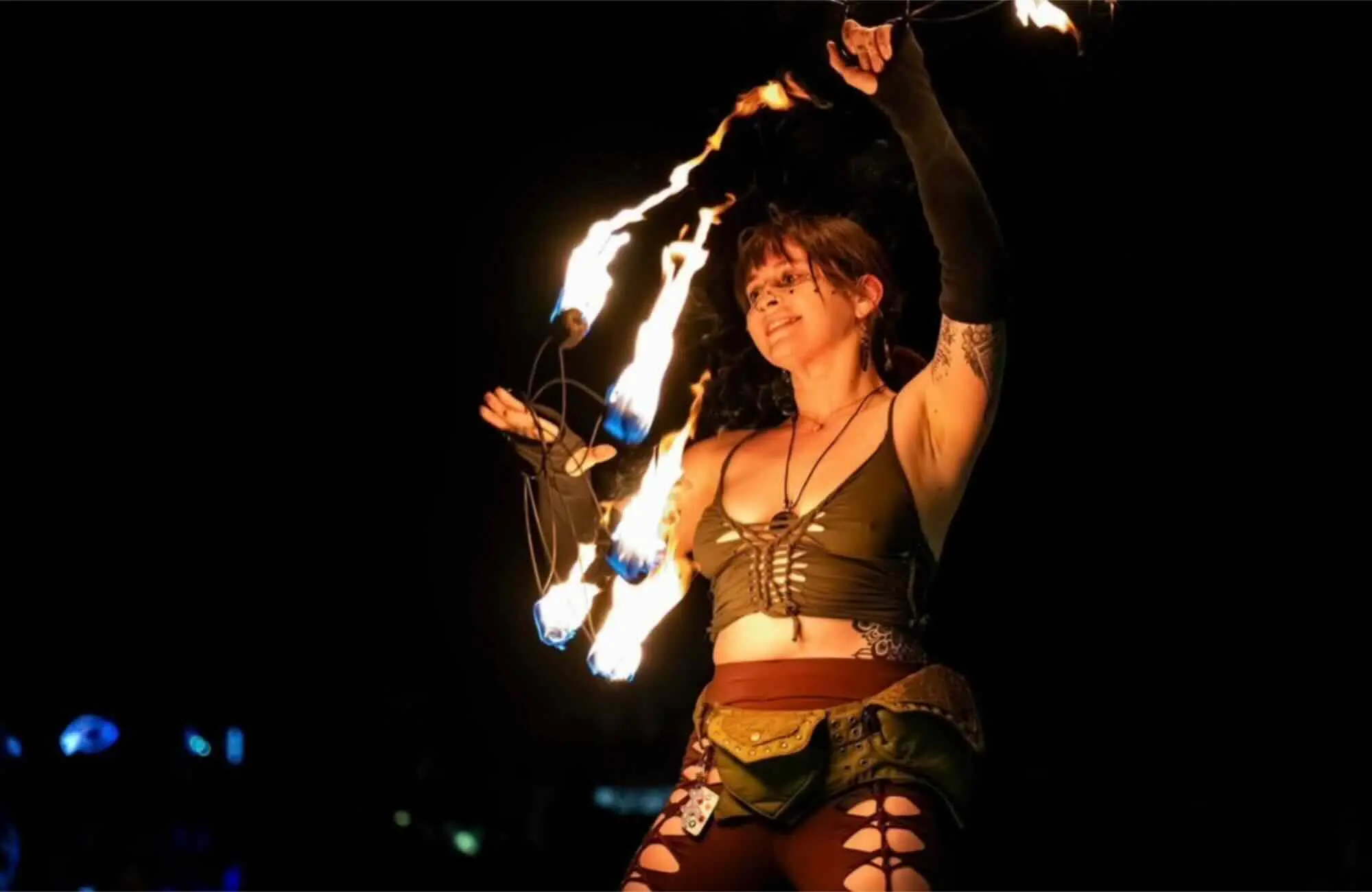 Fire performer at mountain music festival