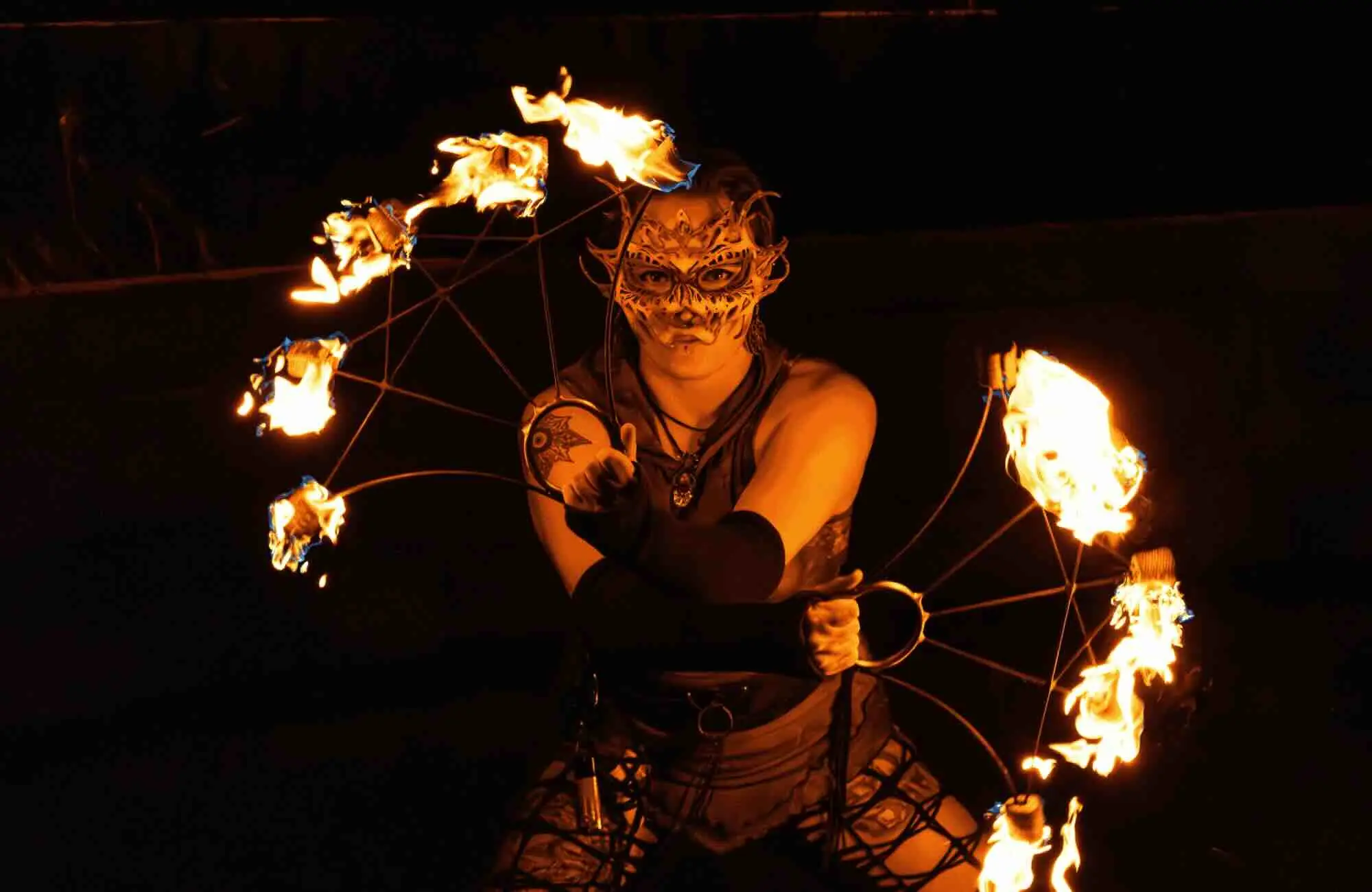 Fire performer at mountain music festival