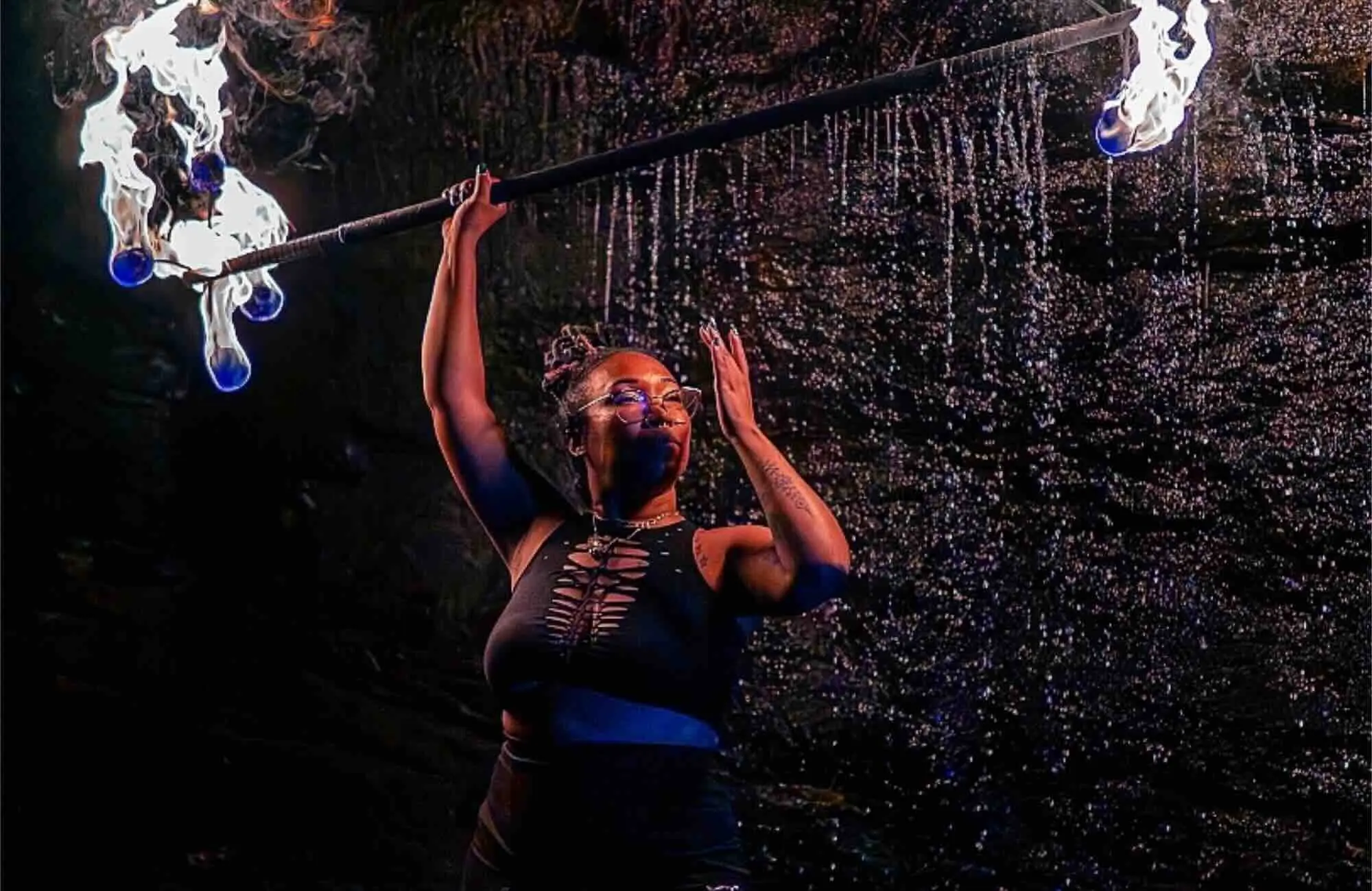 Fire performer at mountain music festival