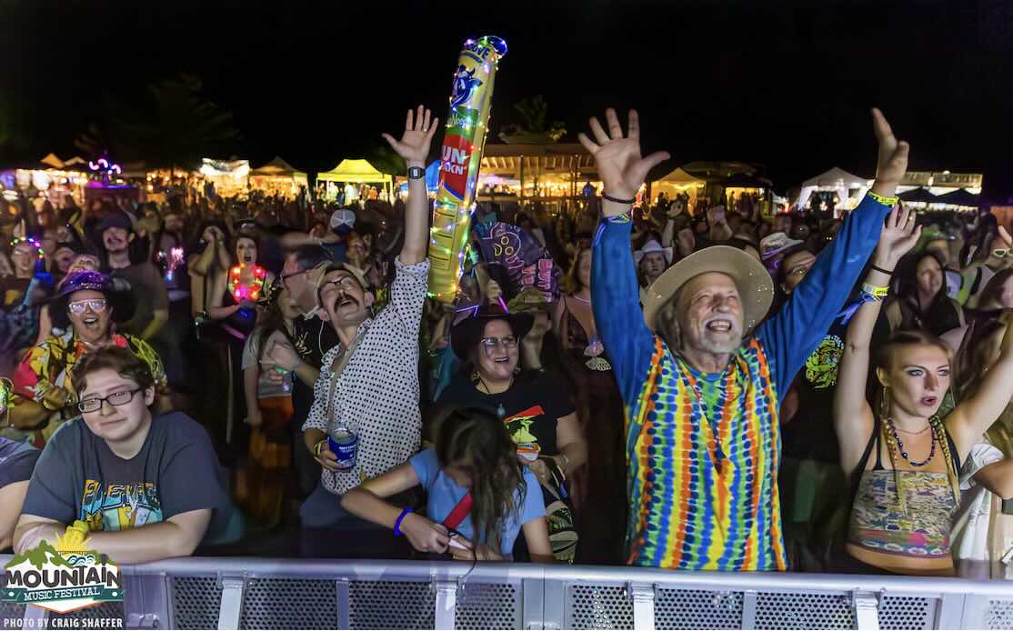 excited crowd at mountain music festival 2026